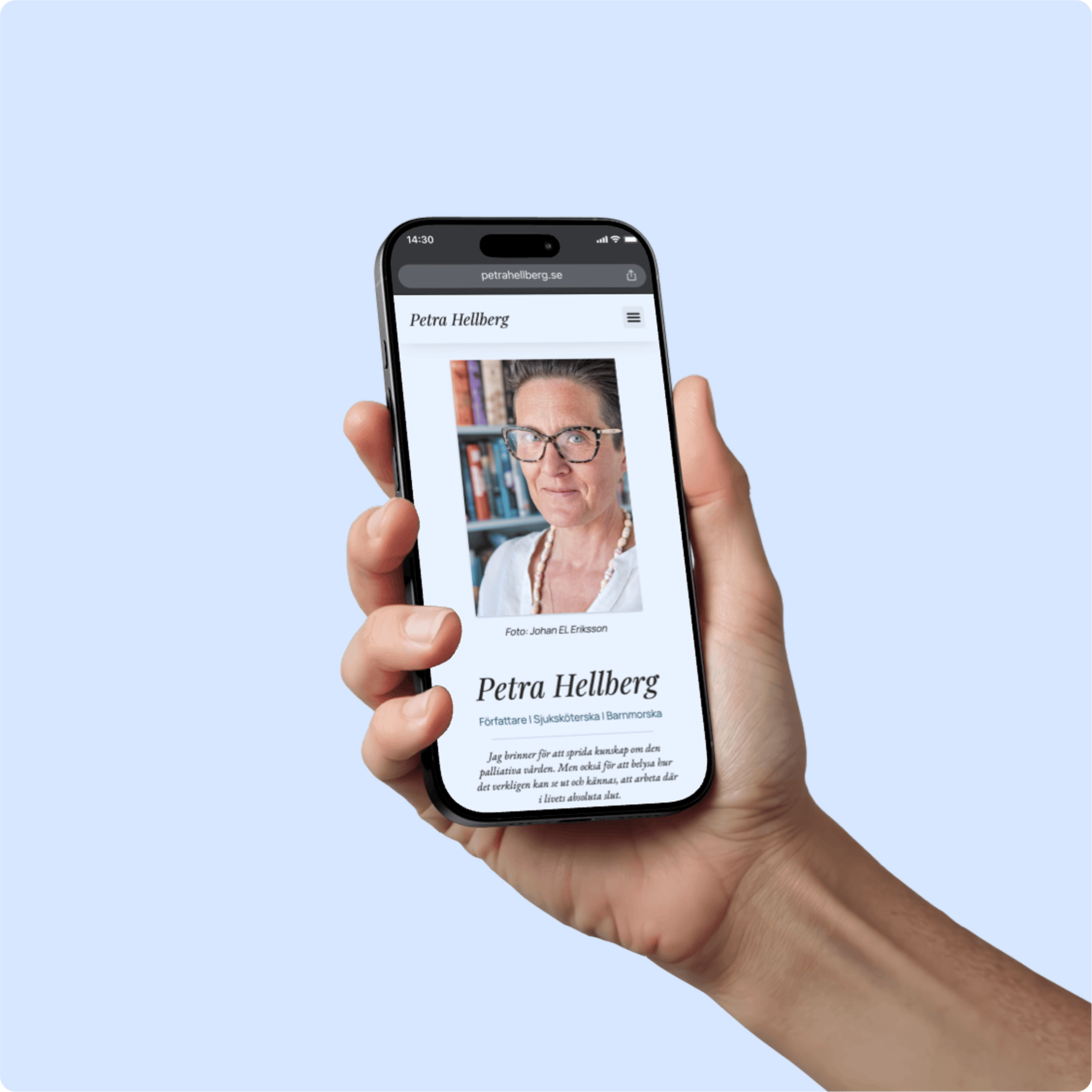 Final website design shown on an iPhone screen